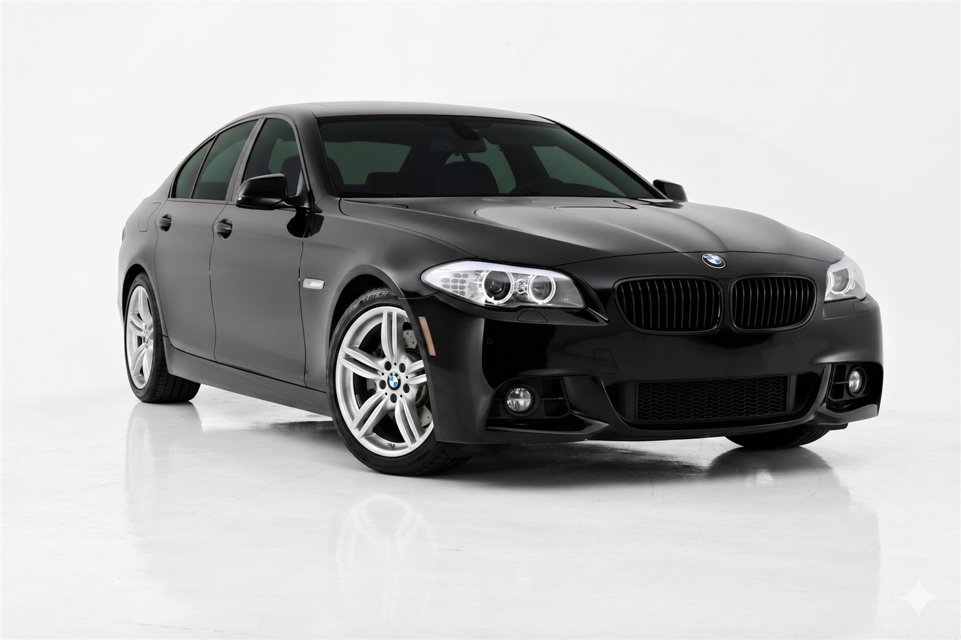 BMW 5 Series F10 shown from the front three-quarter angle